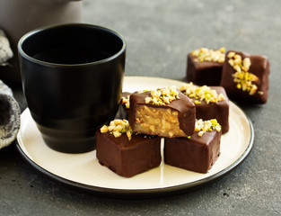 Homemade candy roasted with nuts and caramel. Selective focus