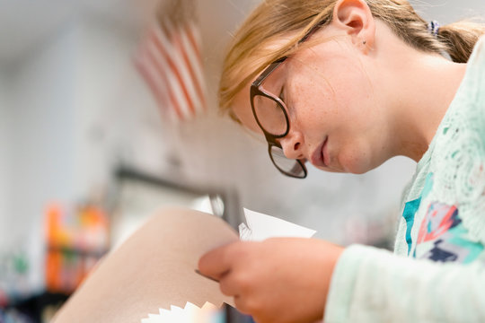 Student working on a crafts project that will resemble ancient Etruscan pottery