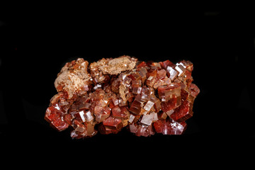 Macro mineral stone Vanadinite on a black background