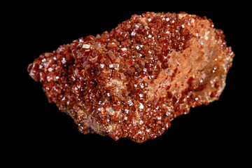 Macro mineral stone Vanadinite on a black background