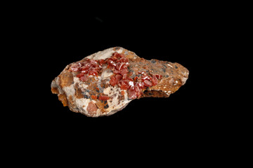 Macro mineral stone Vanadinite on a black background