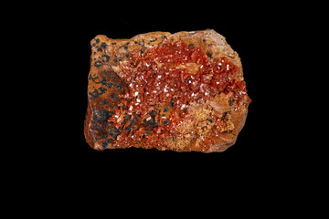 Macro mineral stone Vanadinite on a black background
