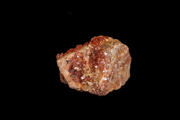Macro mineral stone Vanadinite on a black background