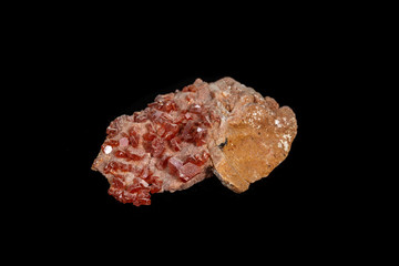 Macro mineral stone Vanadinite on a black background