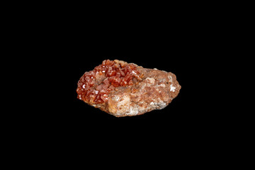 Macro mineral stone Vanadinite on a black background