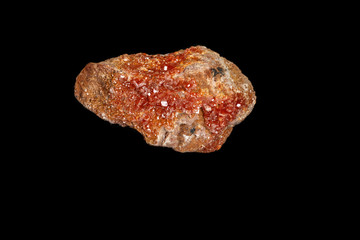 Macro mineral stone Vanadinite on a black background