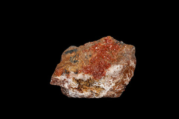 Macro mineral stone Vanadinite on a black background
