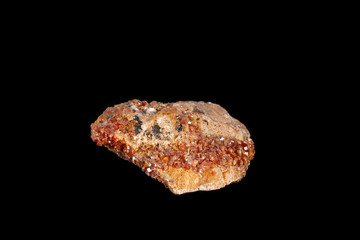 Macro mineral stone Vanadinite on a black background