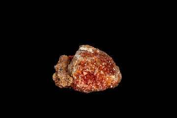 Macro mineral stone Vanadinite on a black background