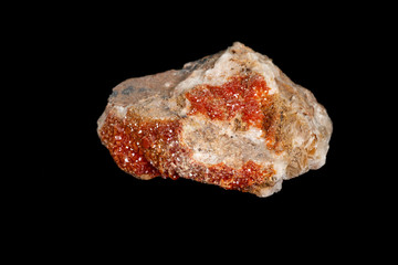 Macro mineral stone Vanadinite on a black background
