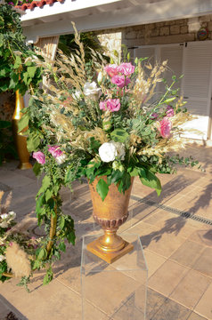 Luxury floral arrangement of pink and white flowers in glass vases. Flowers for wedding decoration