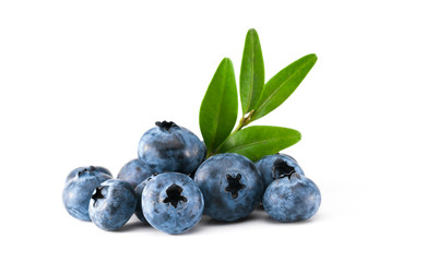 Fresh raw tasty blueberries with leaves isolated on white