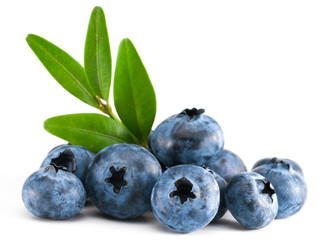 Fresh raw tasty blueberries with leaves isolated on white