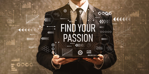 Find your passion with businessman holding a tablet computer on a dark vintage background - obrazy, fototapety, plakaty