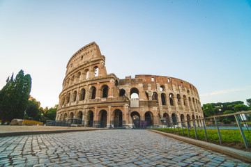 Naklejka na ściany i meble View of the Colosseum in Rome in thea summer morning, Italy