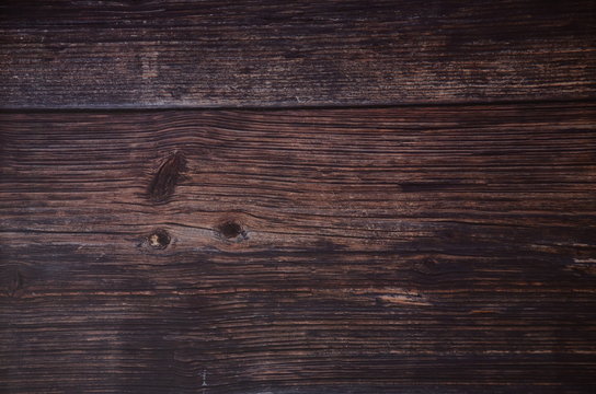Dark vintage wooden table texture background. Top view. Old natural wooden shabby background