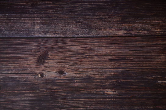 Dark vintage wooden table texture background. Top view. Old natural wooden shabby background