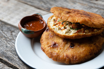 Mexican fried "gorditas" with "chicharron"