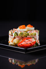 Round salad made of red fish potato and avocado