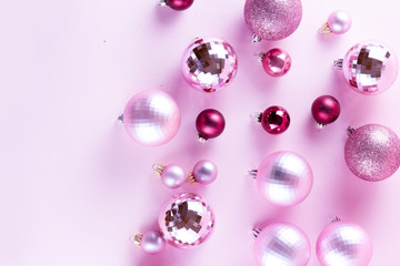 Christmas decorations on pink