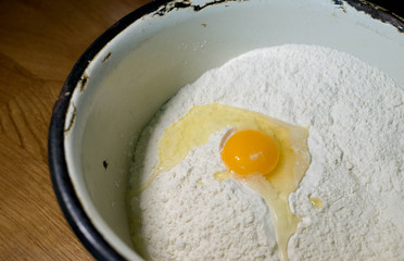 Knead the dough in an old bowl