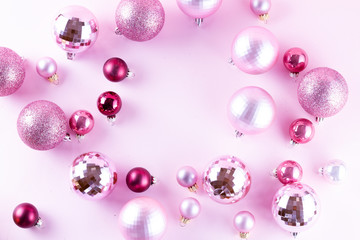 Christmas decorations on pink