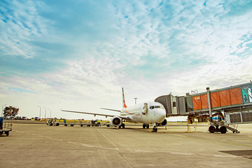 Fototapeta na wymiar International airport with airplane aeroplane aircraft and passenger