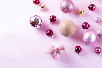 Christmas decorations on pink