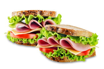 Sandwich with whole grain bread, salad, cheese, tomato and ham on a white isolated background