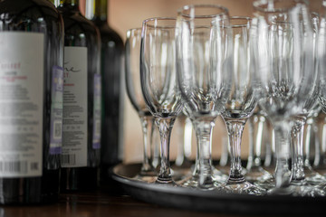 bottles of wine in a restaurant with wine glasses in a bar restaurant
