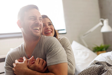 Obraz premium Love couple in bed in the morning