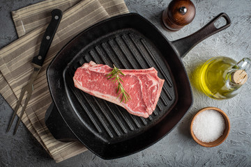 new york strip steak on cast iron pan