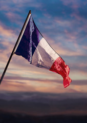 France flag, French flag waving on sky at dusk
