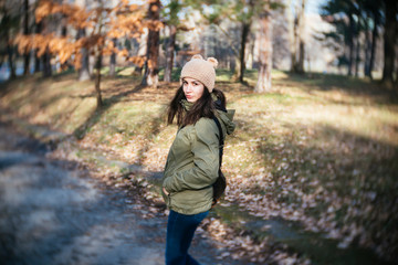 Young woman walking at the park