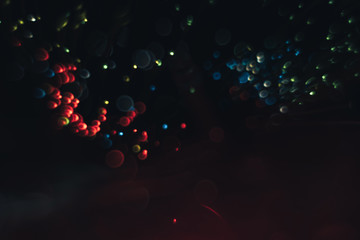 Beautiful multi colored light bokeh on a black background.