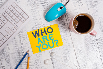 Conceptual hand writing showing Who Are You Question. Concept meaning asking about someone identity...
