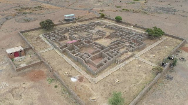 Tilting aerial footage of excavated ruins of Dungur Mansion in former Kingdom of Aksum, landmark destination and historic heritage in Ethiopia Africa