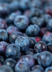 fresh blueberries in a wooden bowl