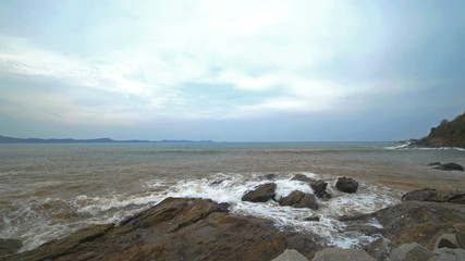 4k video of sea wave with stone at Khao Laem Ya in Mu Ko Samet National Park, Rayong Province, Thailand