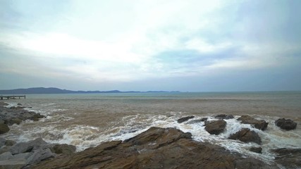 4k video of sea wave with stone at Khao Laem Ya in Mu Ko Samet National Park, Rayong Province, Thailand