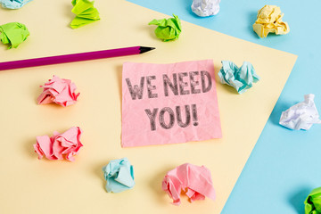 Conceptual hand writing showing We Need You. Concept meaning asking someone to work together for certain job or target Colored crumpled papers empty reminder blue yellow clothespin