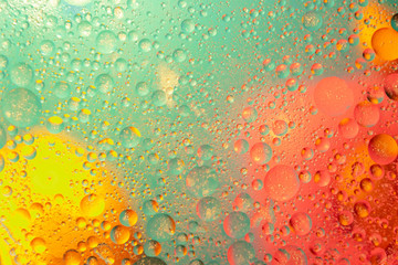 Oil drops in water abstract psychedelic pattern image. Abstract background with colorful gradient colors.