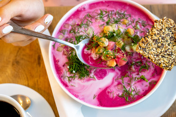 Girl eating healthy brunch breakfast. Detox diet. Vegan food. Green healthy food concept.