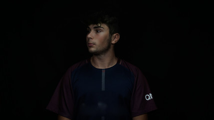 athlete, football player posing for portrait              