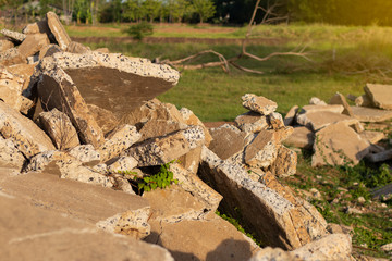 The ruins of concrete piles in the countryside.