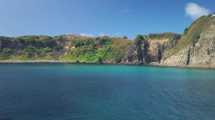 Fernando de Noronha Island, a UNESCO World Heritage site, Pernambuco, Brazil - July, 2019 - 4k footage of Sea kayaking, canoeing, in a beautiful sea water at Porto Santo Antonio beach