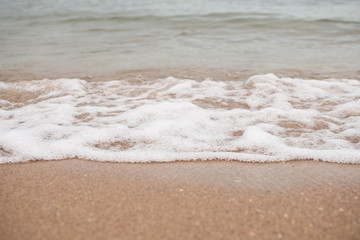 Close-up of Foamy Water Rolling into Shore in Fort Lauderdale