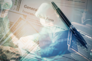 Naklejka premium double exposure background of health insurance card on insurance claim form with pen and overlay with medical doctor in operation room