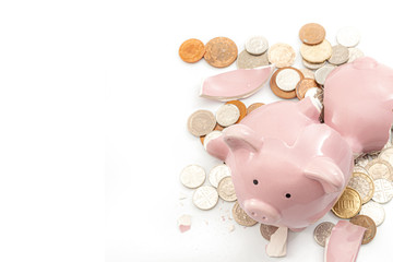 Break the bank, economic downturn and bankruptcy concept theme with a broken piggy bank and...