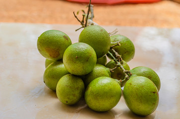 Guineps On Tile Surface